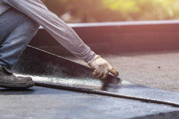 Professional Basement Waterproofing technician working in Gladstone, OR